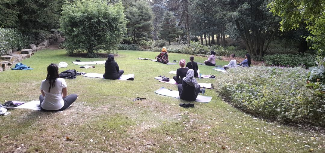 Picture of people doing yoga outside